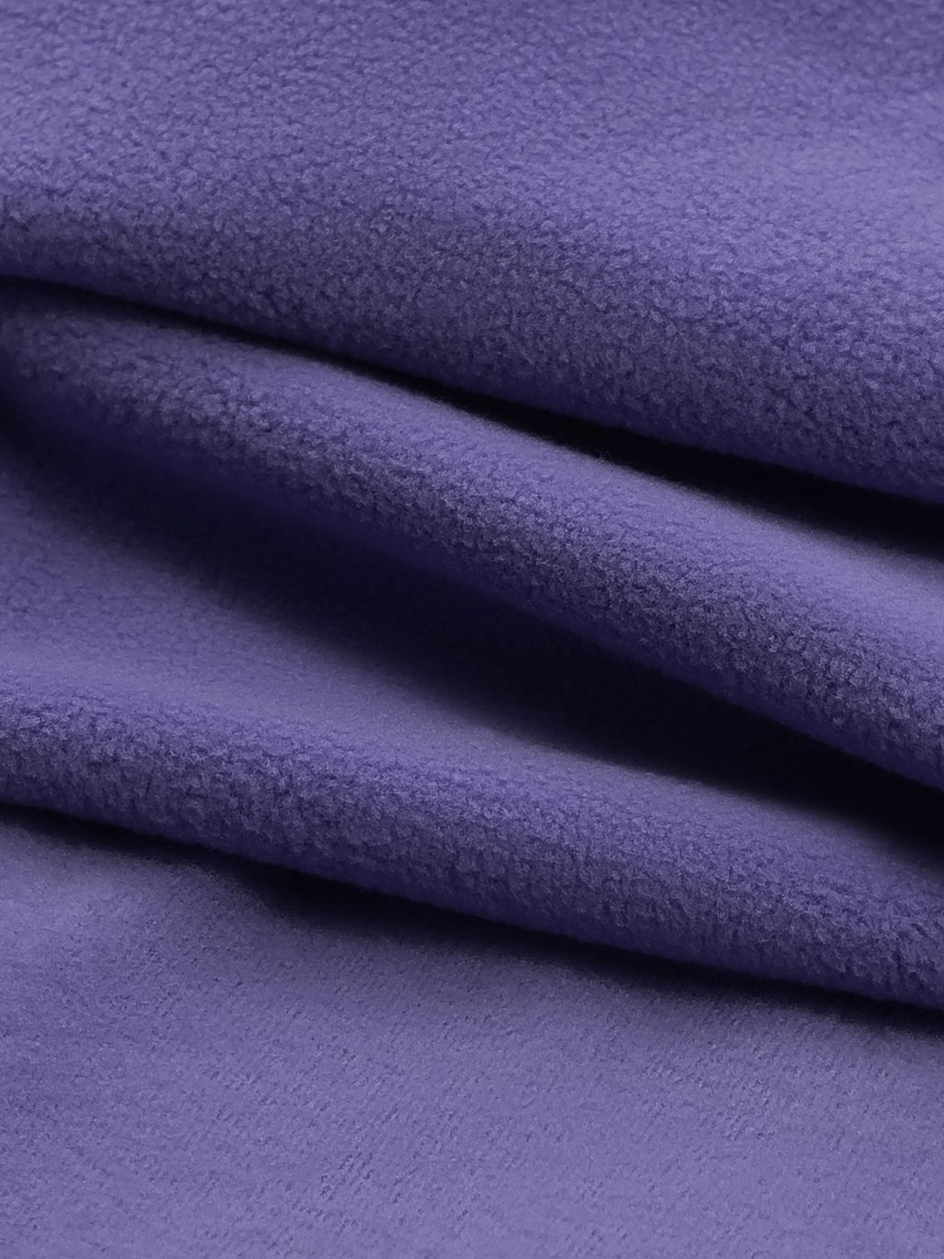 Close-up of brushed fleece fabric surface for apparel sourcing