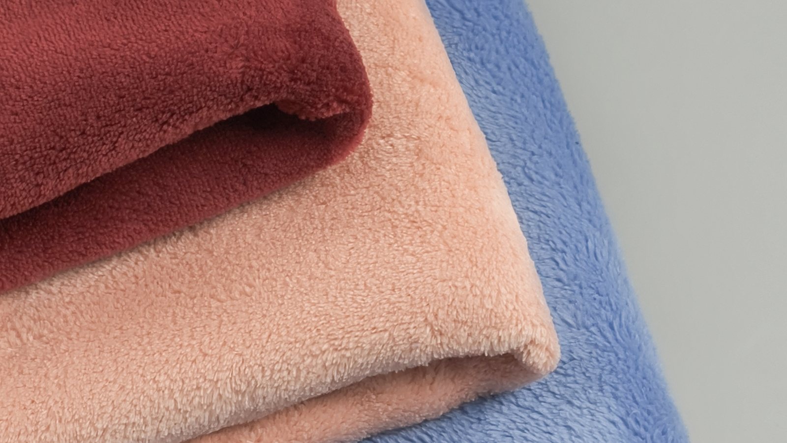Fleece fabric swatches in different colors and textures
