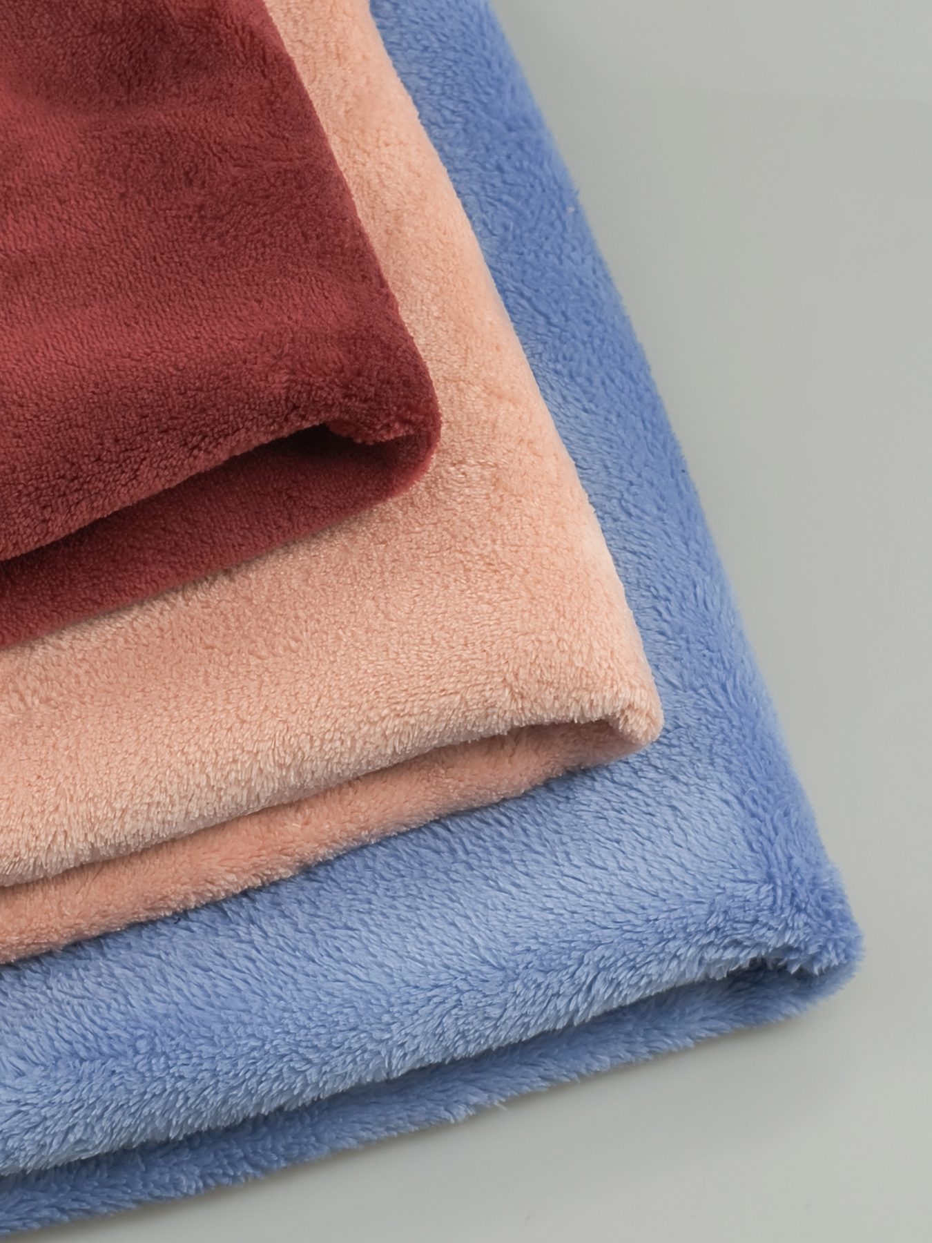 Fleece fabric swatches in different colors and textures